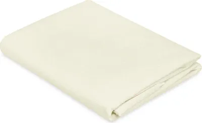 A folded cream-colored mattress protector lies on a white background.