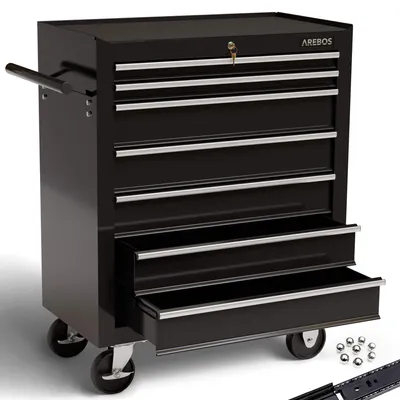 A black AREBOS tool chest with seven drawers, some of which are open, sits on a white background. Several ball bearings are scattered to the right of the tool chest.