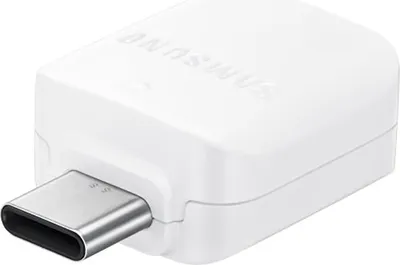A white Samsung adapter with a USB-C connector.