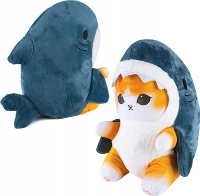 Two plush toys, one of a shark and one of a cat wearing a shark costume, are displayed against a white background.