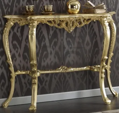 Produktbild von Casa Padrino Luxus Barock Konsole Gold 114 x 31 x H. 83 cm - Prunkvoller Antik Stil Konsolentisch mit wunderschönen Verzierungen - Barock Wohnzimmer Möbel