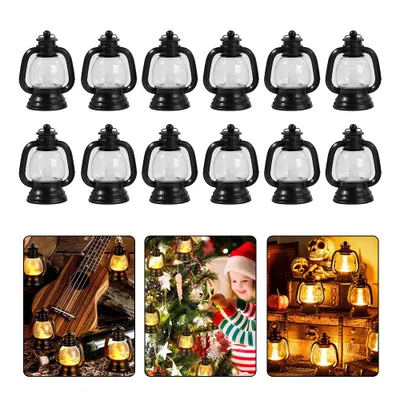 Zdjęcie produktu dla Miniaturowe latarnie świąteczne, czarne, 12 sztuk. Lampki LED imitujące świece, dekoracja stołu w stylu retro. Małe, czarne latarnie świąteczne, idealne do zawieszenia, również na Halloween