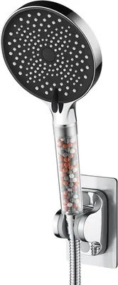 A shower head with a filter and a wall mount.