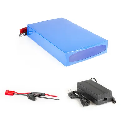 A blue battery pack, a black charger, and a red and black connector are displayed against a white background.