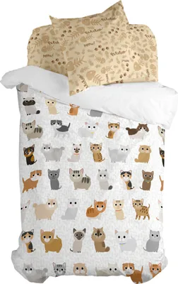 A duvet cover and pillowcases with a pattern of cartoon cats are displayed on a bed.