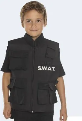 A young boy wearing a SWAT vest.
