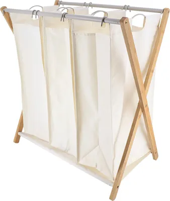 A three-compartment laundry basket made of fabric and wood.