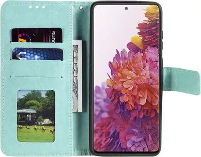 A teal flip case cover for a Samsung Galaxy S20 FE phone, showing the inside with slots for cards and a picture, and the phone displaying a colorful floral wallpaper.