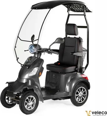 Produktbild von Veleco Faster - Seniorenmobil mit Kapitänssitz - herausnehmbarer Lithium Ion Akku - Dach mit Windschutzscheibe - Mobilitätsroller - 1000W (Grau)