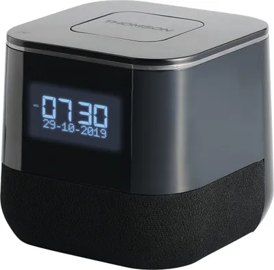 A black Thomson radio alarm clock with a digital display showing the time and date.