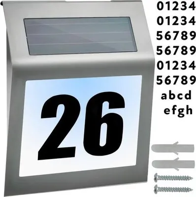 A solar-powered house number sign with the number 26 displayed prominently, along with mounting hardware and a set of customizable numbers and letters.