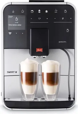 A Melitta Caffeo Barista T Smart coffee machine with two glasses of coffee filled.