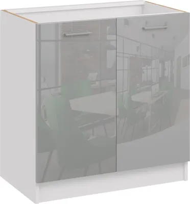 A white kitchen base cabinet with two high-gloss gray doors and silver handles. The doors reflect an interior scene with tables and green chairs.