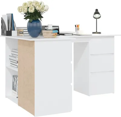 A white corner desk with a bookshelf on the left side and drawers on the right side. A vase of flowers and some books are on the desk.