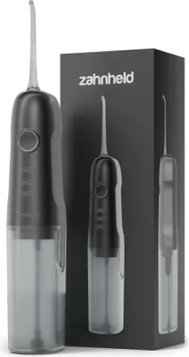 A black and gray electric oral irrigator and its packaging are displayed against a white background.