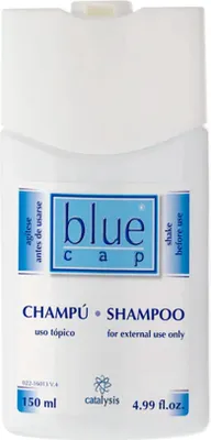 A white bottle of Blue Cap shampoo against a white background.