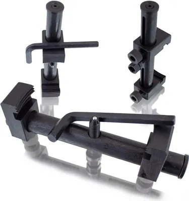 Three black metal tools for removing pulleys, arranged on a white background.