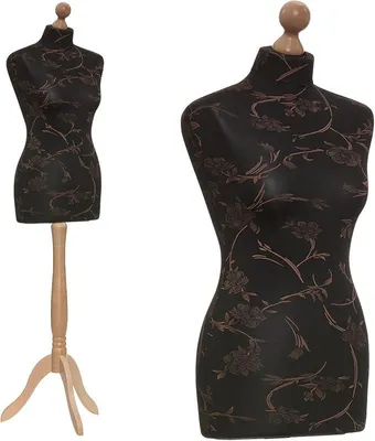 Imagen del producto de Muñeca de vestir de género femenino, talla 36/38, con cubierta de tela estampada con flores en tonos y marrón, y trípode de madera de haya