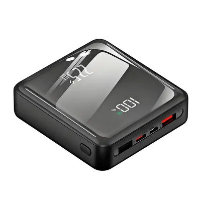 A black power bank with a reflective screen displaying battery percentage.