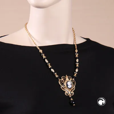 Produktbild von Collier Gemme goldfarbene Kordelkette aus Metall schwarze Kunststoffperlen 50cm