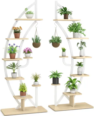 Two multi-tiered plant stands with various potted plants on each tier, set against a white background.