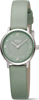A studio shot of a women's watch with a green dial and strap.