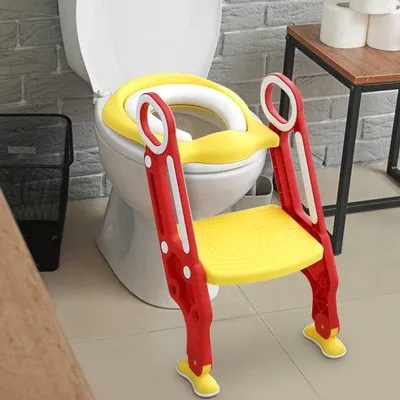 Productafbeelding van Famanu toilet trainingsstoel voor kinderen met verstelbaar voetsteuntje en antislipvoeten - Rood + Geel