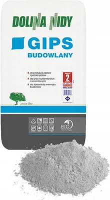 A bag of Dolina Nidy Baugips (building gypsum) with a pile of the product in front of it.