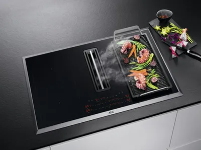 Produktbild von AEG - CCE84751XB - Einbau-Induktions-Kochfeld mit integriertem Dunsabzug - Umluft