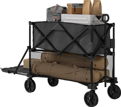 A black collapsible garden wagon loaded with various items, including bags, a basket, and what appear to be rolled-up mats or sleeping bags.