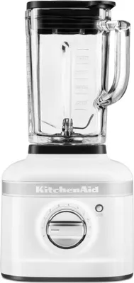 A white KitchenAid blender is shown against a white background.