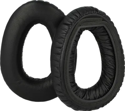 Two black headphone ear pads are shown against a white background.