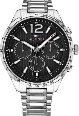 A close-up studio shot of a Tommy Hilfiger men's watch.