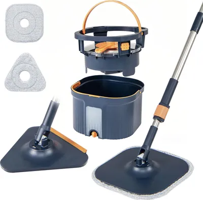 A flat lay of a mop and bucket cleaning system, with extra mop heads.