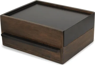 A product shot of a wooden jewelry box with a black top and drawer.