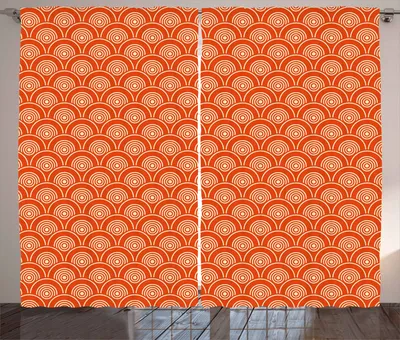 A close-up view of a pair of curtains with a geometric pattern.