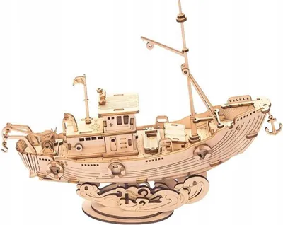 A wooden model of a fishing boat on a stand made of wooden waves.