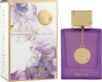 A perfume box and bottle are displayed side-by-side against a white background.