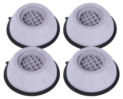 Four anti-vibration pads for a washing machine are arranged in a 2x2 grid on a white background.