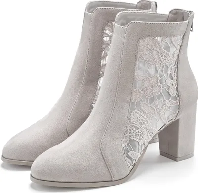 A pair of grey lace-up ankle boots with block heels, shown from a three-quarter angle against a white background.