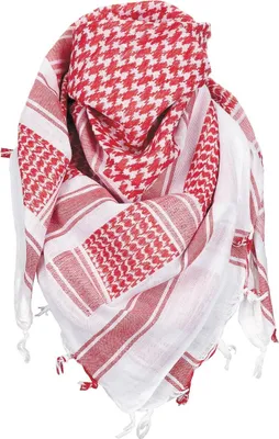 A folded red and white keffiyeh scarf.