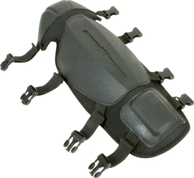 A black protective shin guard with straps and buckles, shown against a white background.