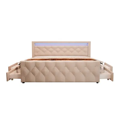 A beige upholstered bed with a diamond-stitched headboard and footboard, featuring integrated LED lighting along the top of the headboard. The bed frame has four visible drawers, two on each side, partially pulled out.