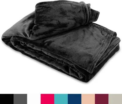 A folded black fleece blanket is shown against a white background.