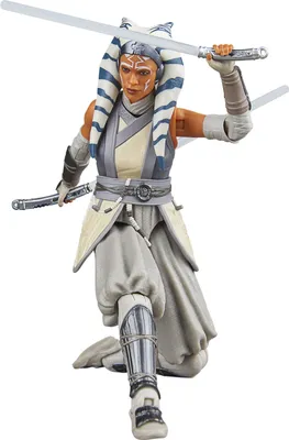 A Star Wars Ahsoka Tano action figure in a dynamic pose, holding two lightsabers.