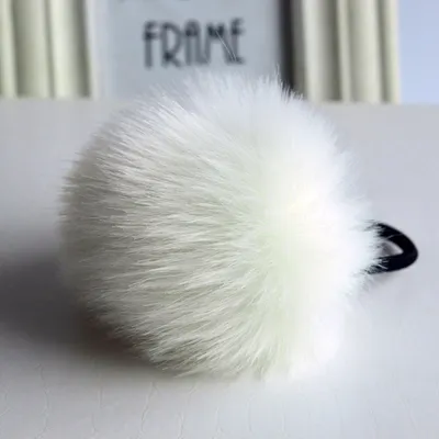 Immagine prodotto di Gomma per capelli Rabbit Bianca - Eleganza e Stile per i Tuoi Capelli KP1634