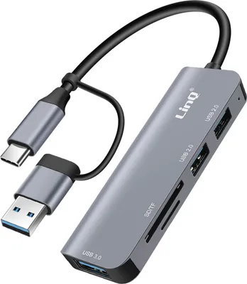 A gray USB hub with multiple ports and cables connected to it, shown against a white background.