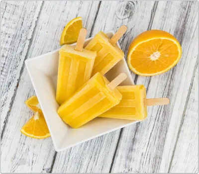 Produktbild von Spritzschutz Herdabdeckplatte Schneidebrett aus Glas Eis aus Orange 1-Teilig (60x52cm)