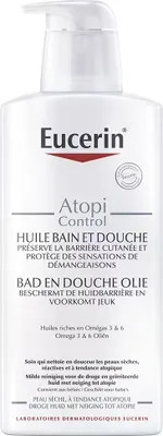 A white pump bottle of Eucerin Atopi Control bath and shower oil.