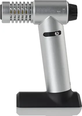 A silver and black flambé torch is shown against a white background.